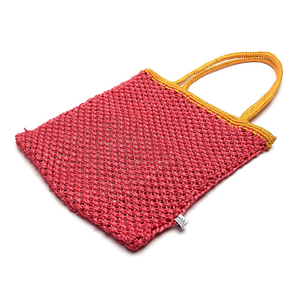 Bell & Fox Kiyana Hand Woven Macrame Bag in Hot Pink & Ochre