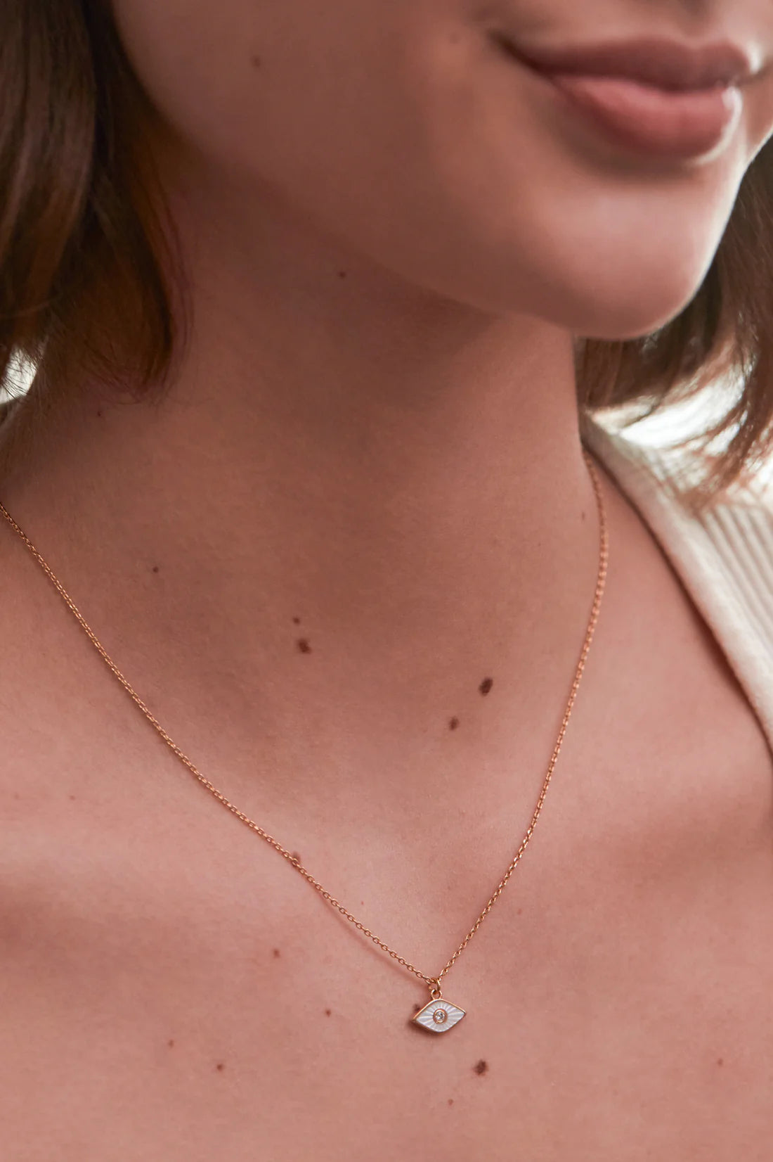 Estella Bartlett Pearl Evil Eye Necklace in Gold - EBN6649G